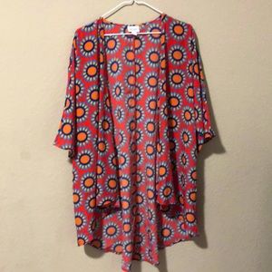 LulaRoe vibrant orange pattern layer.